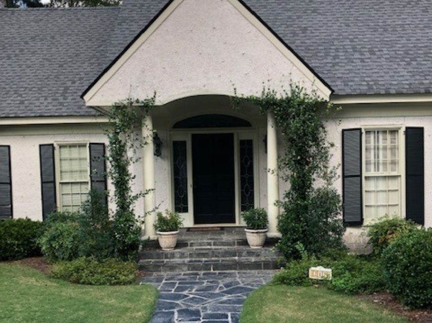 grey house with black shutters