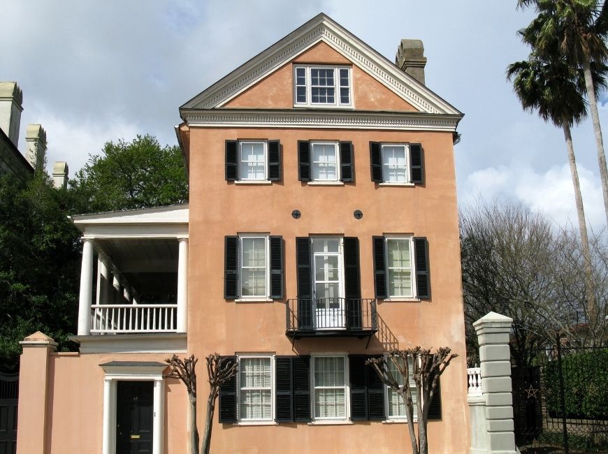 pink house with black shutters