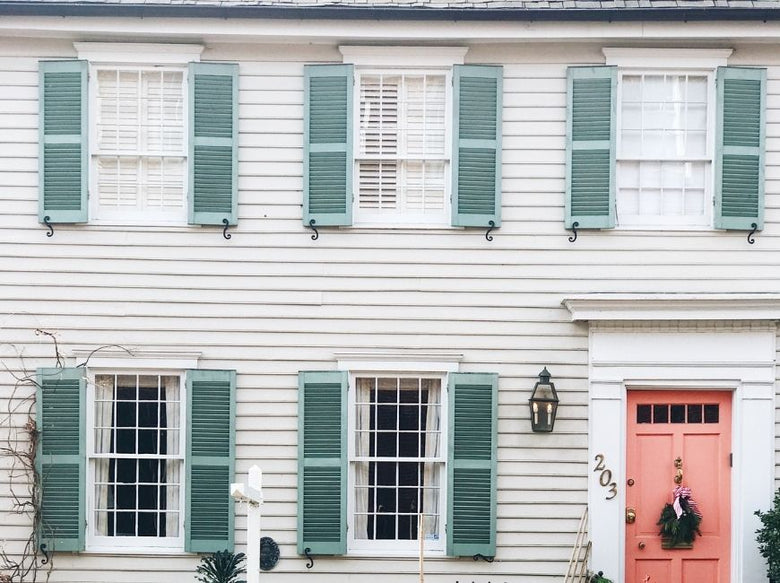 white house with light blue shutters