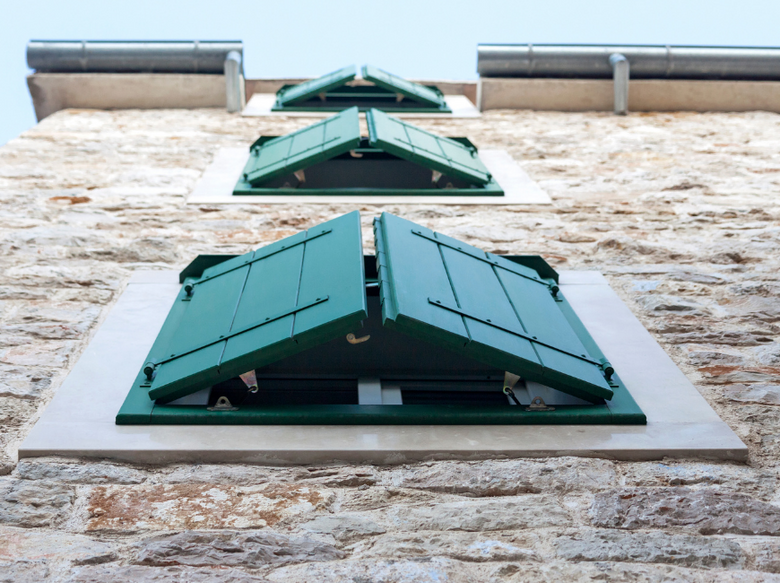 board and batten shutters green exterior