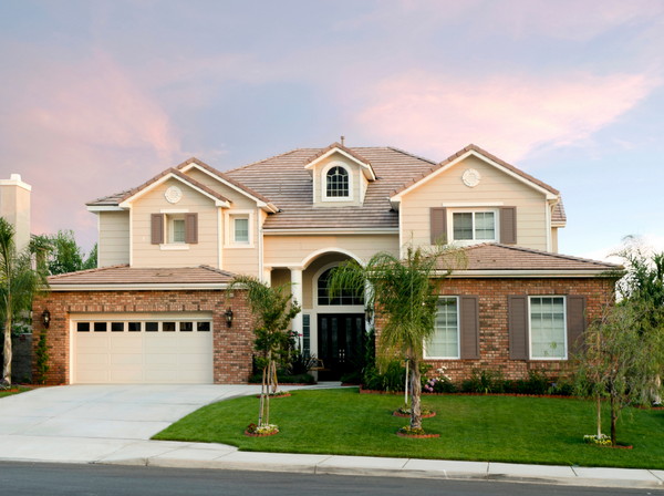 House with brown flat panel shutters